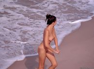 Naked Brunette Woman On The Beach - dark haired amateur naked
