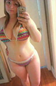 Chubby Gal Teasing In A Selfie