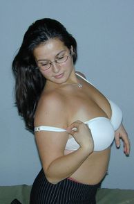 Chubby Lady In White Bra And Glasses